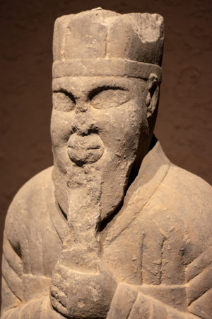 Luoyang, Henan Province / China - January 5, 2016: Ancient stone statue of nobleman, exhibition of...