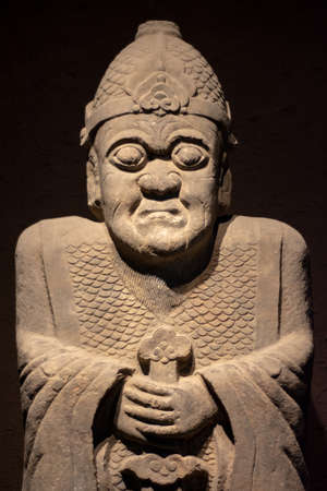 Luoyang, Henan Province / China - January 5, 2016: Ancient stone statue of a warrior, exhibition of ancient stone carving art in Luoyang Museum in Luoyang, Chinaのeditorial素材