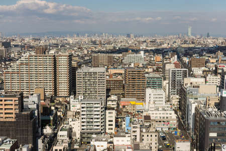 Osaka / Japan - January 13, 2018: Panoramic view of urban cityscape of the city of Osaka in Japanのeditorial素材