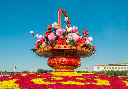 Beijing / China - September 27, 2014: Huge flower display set up in Tiananmen Square to celebrate the National Day of China (65th Anniversary of the Founding of PR of China)のeditorial素材