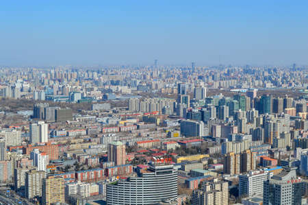 Beijing / China - March 1, 2014: Aerial view of downtown Beijing, view from the Central Radio and TV Tower in Beijingのeditorial素材