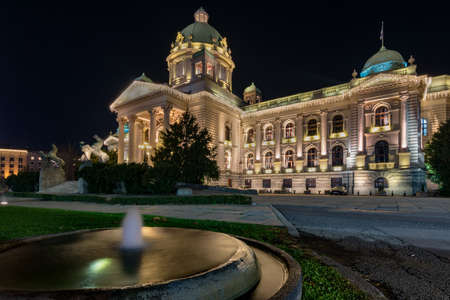 Night view of the National Assembly of the Republic of Serbia illuminated with New Year street lights decorations, Belgrade, Serbiaのeditorial素材