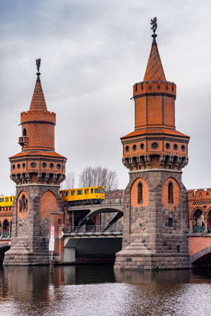 Berlin / Germany - February 19, 2017: Oberbaum Bridge (OberbaumbrÃ¼cke), landmark of Berlin, connecting districts of Kreuzberg and Friedrichshain across river Spreeのeditorial素材