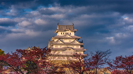 Beautiful Himeji Castle in Himeji city in Hyogo Prefecture in the Kansai region of Japan during Autumn with red maple leavesのeditorial素材