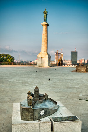 Belgrade / Serbia - August 4, 2019: Maquette sculpture of the Belgrade fortress (Kalemegdan) with Victor monument in the background, Belgrade, Serbiaのeditorial素材