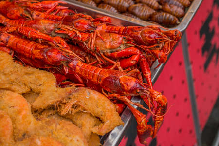 A closeup of cooked lobster being sold at a seafood restaurantの写真素材