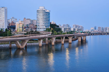 Dusk view of Han River and skyscrapers in Yeouido in Seoul, South Korea on 31 May 2022
