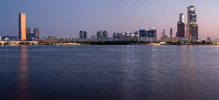 Dusk view of Han River and skyscrapers in Yeouido in Seoul, South Korea on 31 May 2022のeditorial素材