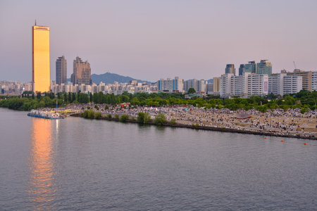 Dusk view of Han River and skyscrapers in Yeouido in Seoul, South Korea on 31 May 2022のeditorial素材