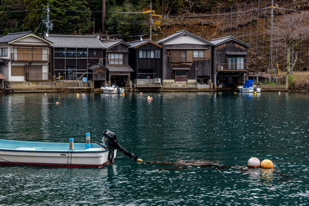 Traditional wooden fishermen Funaya boathouses in Ine north Kyoto prefecture on the Sea of Japanの写真素材