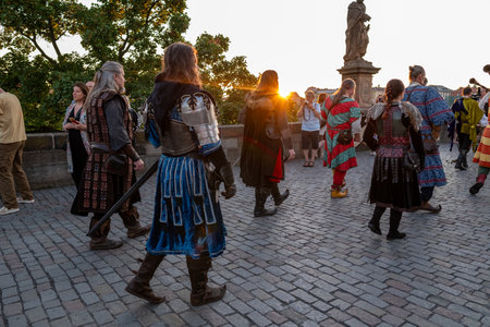 Sunrise parade medieval historic reenactment to commemorate 667th anniversary of laying the foundation stone of iconic Charles Bridge in Prague, Czech Republic, on 9 July 2024のeditorial素材