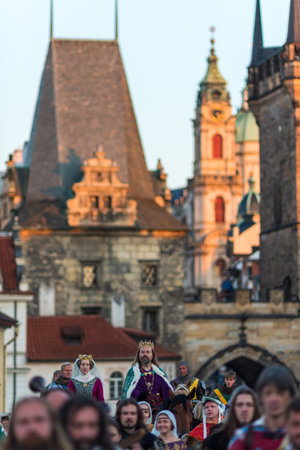 Sunrise parade medieval historic reenactment to commemorate 667th anniversary of laying the foundation stone of iconic Charles Bridge in Prague, Czech Republic, on 9 July 2024のeditorial素材