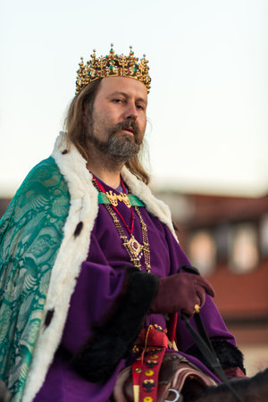 Sunrise parade medieval historic reenactment to commemorate 667th anniversary of laying the foundation stone of iconic Charles Bridge in Prague, Czech Republic, on 9 July 2024のeditorial素材