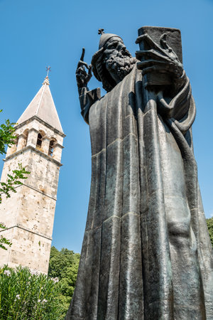 Statue of bishop Grgur Ninski (Gregory of Nin), medieval Croatian Catholic prelate, work of sculptor Ivan Mestrovic in the Giardin Park in Split, Croatia on 29 August 2024の写真素材
