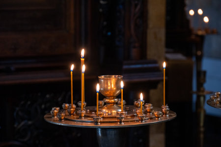 Candles in the Sioni Cathedral of the Dormition, Georgian Orthodox cathedral located in historic Old Town of Tbilisi, the capital of Georgiaの写真素材