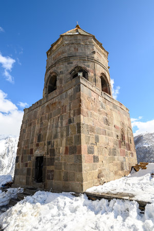 Gergeti Trinity Church near the village of Stepantsminda, popular tourist destination in the Caucasus mountains in Georgiaの写真素材