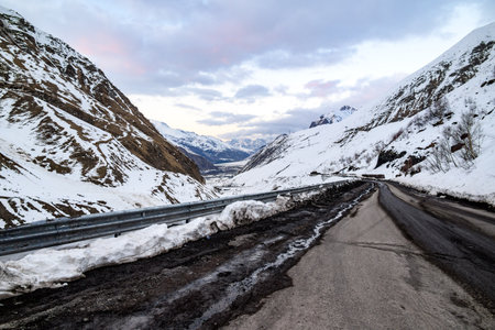 Terek river valley and mountain pass on the Georgian Military Road, major route through the Caucasus from Georgia to Russia connecting Tbilisi and Vladikavkazの写真素材