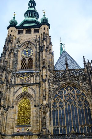 Architectural details on the facade of the St. Vitus Metropolitan Catholic Cathedral in the Prague Castle complex in Prague, Czech Republic on 7 February 2025の写真素材