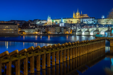 Panoramic night view of the iconic Charles Bridge over Vltava river and Prague Old town cityscape, in Prague, Czech Republic, on 19 February 2025の写真素材