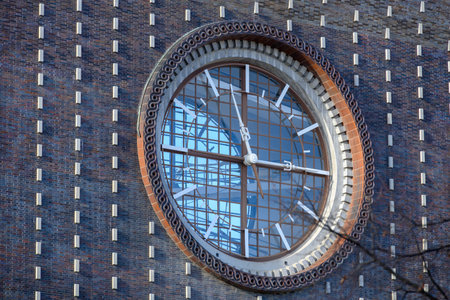Huge clock in the tower of the Church of the Most Sacred Heart of Our Lord, Roman Catholic church at...