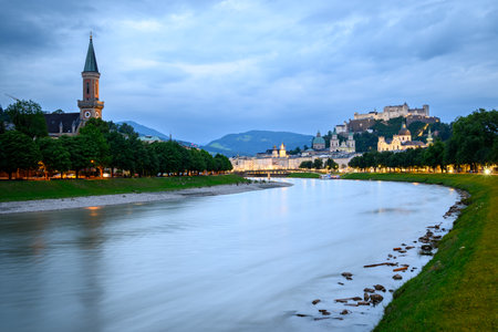 Salzach River and cityscape of Salzburg, birthplace of Mozart and a UNESCO World Heritage Site, in Salzburg, Austria on 10 July 2025の写真素材