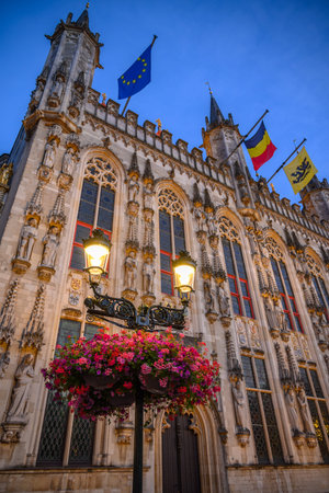 Evening view of Historic Bruges City Hall building on Burg Square in Bruges, West Flanders, Belgium on 17 July 2025の写真素材