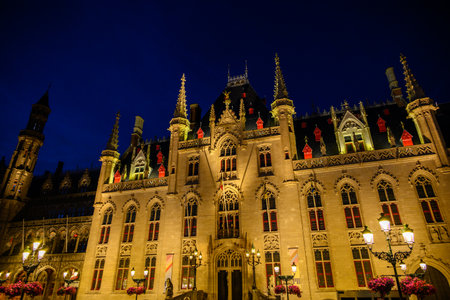 Night view of Historic Provincial Court (Provinciaal Hof) building, former Provincial Government of West Flanders, on the Markt main square in Bruges, Belgium on 17 July 2025の写真素材