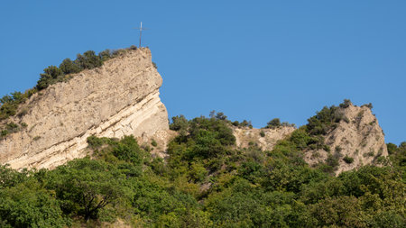 Cross on a hill above Shio-Mgvime Monastery, medieval monastic complex of Georgian Orthodox Church near the town of Mtskheta in Georgia on 31 August 2025の写真素材