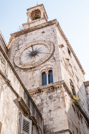 The Belltower of the Church of Our Lady of the Belfry within the Iron Gate of ancient Roman Historical Complex of the Palace of Diocletian, UNESCO world heritage site in Split, Republic of Croatiaの写真素材