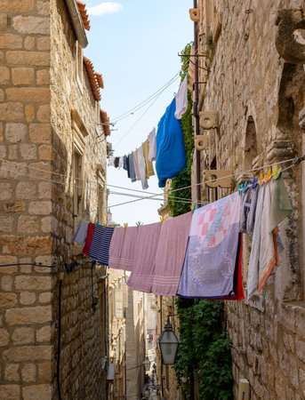 Staircased narrow cobblestone alley in the medieval old town of Dubrovnik in Dalmatia, Croatia on 27 August 2024の写真素材