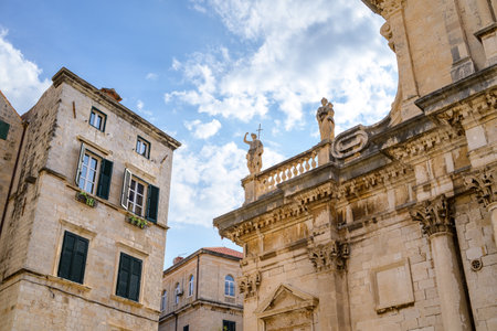 Statues on the Roman Catholic Cathedral of the Assumption of the Virgin Mary in Old town Dubrovnik, Republic of Croatiaの写真素材