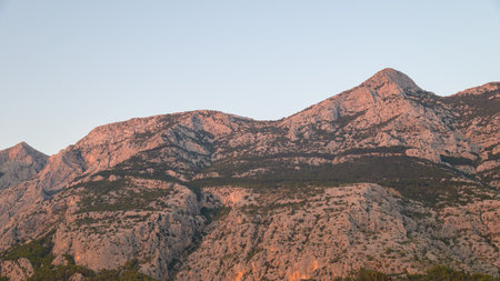 View of the Biokovo mountain range of the Dinaric Alps from Makarska riviera, Adriatic sea coast of Croatiaの写真素材