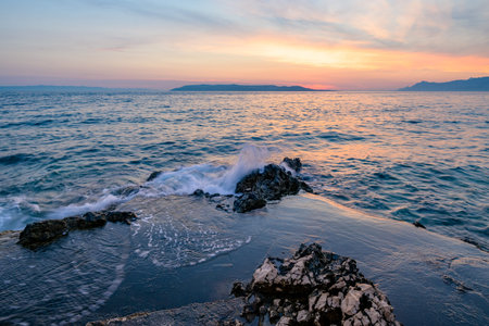 Colorful sunset on Makarska Riviera, popular touristic coastline of the Adriatic Sea in...