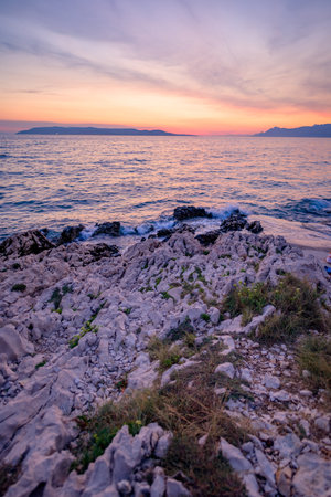 Colorful sunset on Makarska Riviera, popular touristic coastline of the Adriatic Sea in...