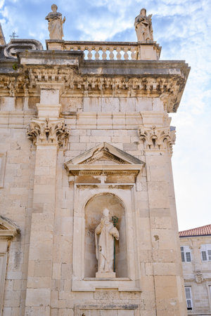 Statues on the Roman Catholic Cathedral of the Assumption of the Virgin Mary in Old town Dubrovnik, Republic of Croatiaの写真素材