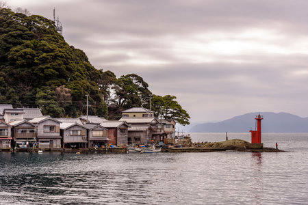 Traditional wooden fishermen Funaya boathouses in Ine north Kyoto prefecture on the Sea of Japanの写真素材