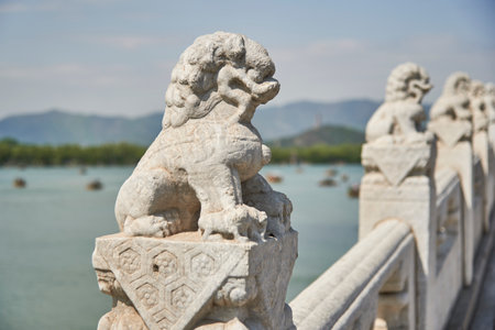 Dragons on Seventeen-Arch Bridge (Shiqikong Qiao) in The Summer Palace, complex of lakes, gardens, pavilions and palaces in Beijing, Chinaの写真素材