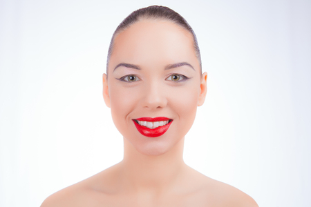 Face of a young girl with red lipsの写真素材