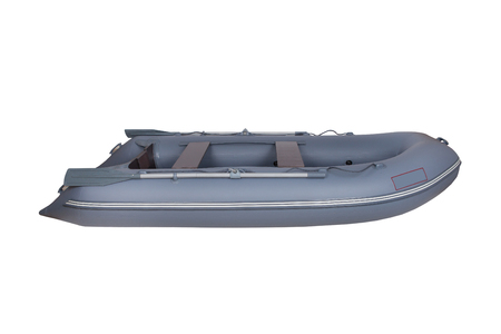 Inflatable rubber boat for two. isolated on white background, view from the sideの写真素材