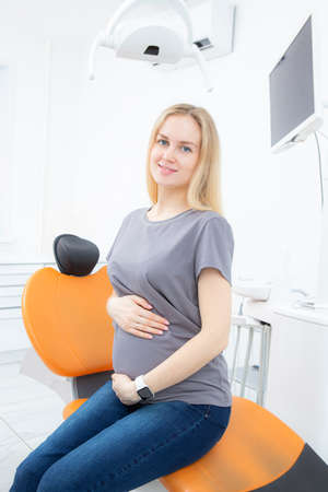 pregnant woman in a modern dental office. Dentistryの写真素材