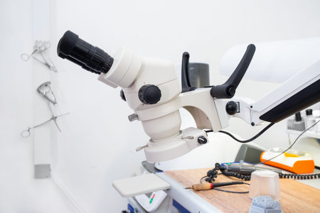 Microscope in a dental laboratory, a technicians workplace in a dental laboratory