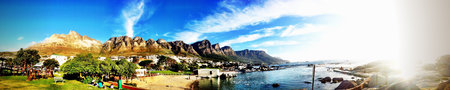 Stunning panoramic view of Table Mountain from the opposite end with both beach mountain and ocean. 