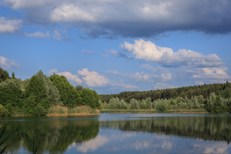 Lake baggersee in Bavaria at sunset of a blue skyの写真素材