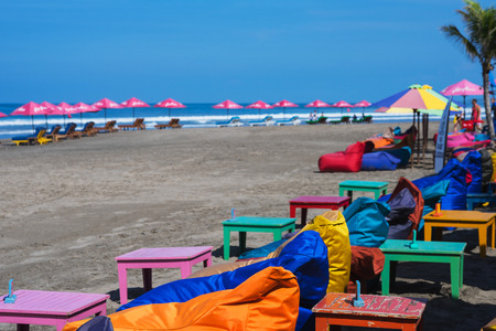 morning tropical landscape: empty soft chairs and loungers on the beachの写真素材