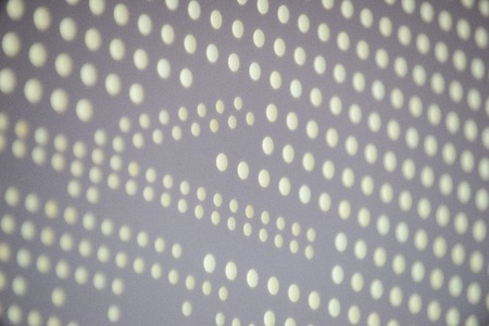 element of the exhibition stand design. abstract colored plastic holes on luminous white background. abstraction, background element.の写真素材