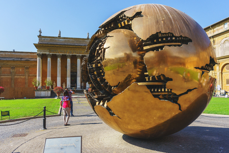 Rome, Italy - July 2016: Close-up details of a metal sphere of the courtyard of the Vatican Museum. Spheres within spheres - a monument in the Cortile della Pigna. Photos from a journey to Rome.のeditorial素材