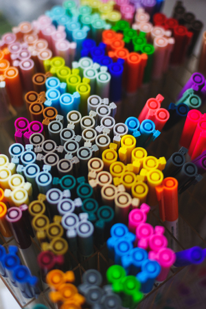 set of wooden natural brushes for drawing with watercolor paints. several different brushes made from natural wool for watercolors and oil in a box, top view, soft focus and beautiful bokeh.の写真素材