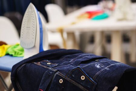 Stage processing denim jacket for the special effect of the old thing. Customization and decoration of jeans. Soft focus.の写真素材