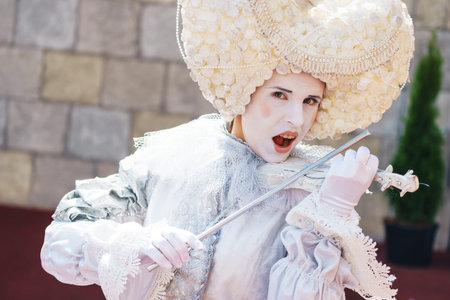 June 2018, Moscow. Bright performance during the holiday, events and carnival. Masquerade. Mime with...