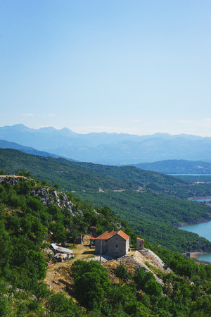 Fascinating landscape and panorama overlooking the lakes, mountains and valleys. Travel to Montenegro. Calm summer day in the Balkans.の写真素材